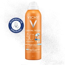 Bruma infantil protectora solar antiarena Vichy Capital Soleil SPF50+ 200ml con textura de fondo y sello dermatológico