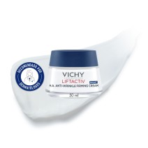 Crema de noche Vichy Liftactiv Supreme de 50 ml con textura de fondo y sello dermatológico
