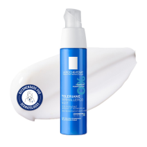 Tratamiento de noche reparador calmante Toleraine de La Roche-Posay con textura de fondo y sello dermatológico