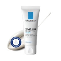 Crema Hidratante Toleriane Sensitive Rica 40 ml de La Roche Posay con textura de fondo y sello dermatológico