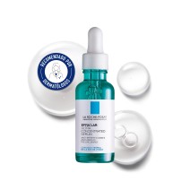 Sérum antiacné concentrado Effaclar 30ml La Roche Posay con textura de fondo y sello dermatológico