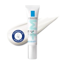 Tratamiento anti acné Effaclar Duo [+]M 40 ml de La Roche Posay con textura de fondo y sello dermatológio